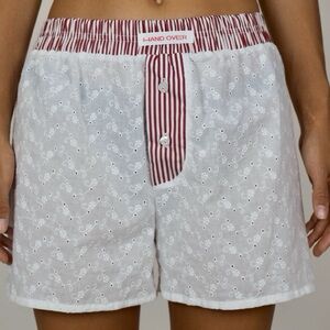 Hand Over White Lace Shorts